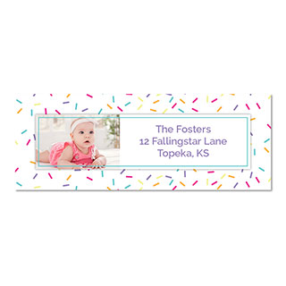 Address Labels: A personalized return address label with a colorful sprinkle design and a photo of a baby.