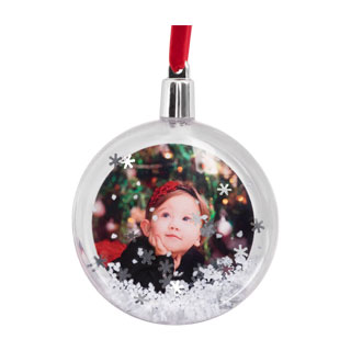Ornaments: A clear, ball-shaped snow globe ornament with a personalized photo inside.