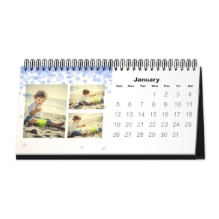 Desk Calendars: A personalized desktop calendar with a photo collage of a boy at the beach.