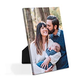Desk Canvas: A vertical easel-back canvas print with a full-bleed photo of a family.