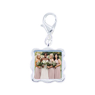 Wave Bracelet Charm: A square silver bracelet charm with wavy edges and a photo of a bride and bridesmaids.