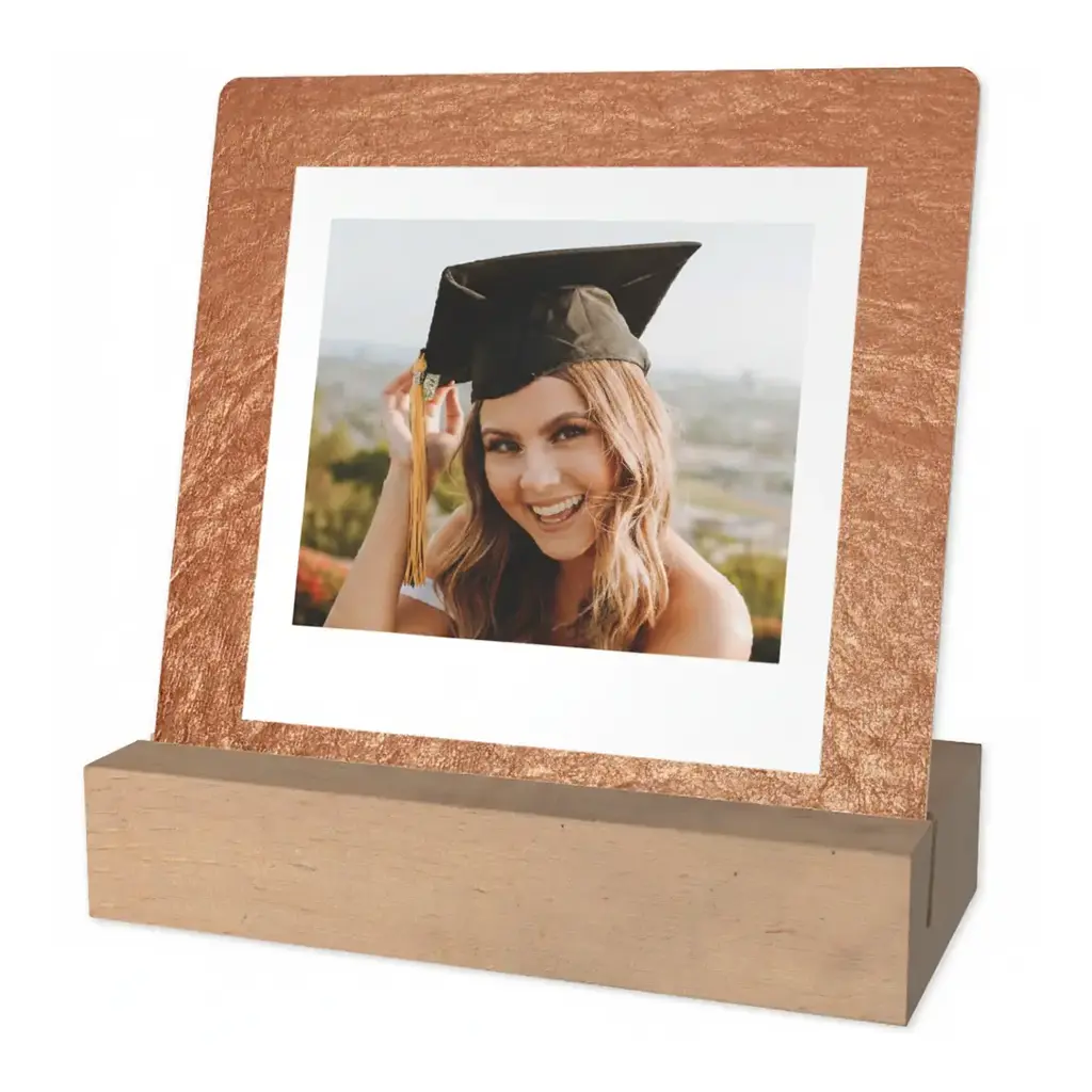 Personalized graduation desk art including custom nameplates and photo plaques to celebrate 2026 career beginnings.