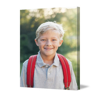 Gallery wrapped canvas print displaying a full-bleed student portrait, a lasting school photo gift.