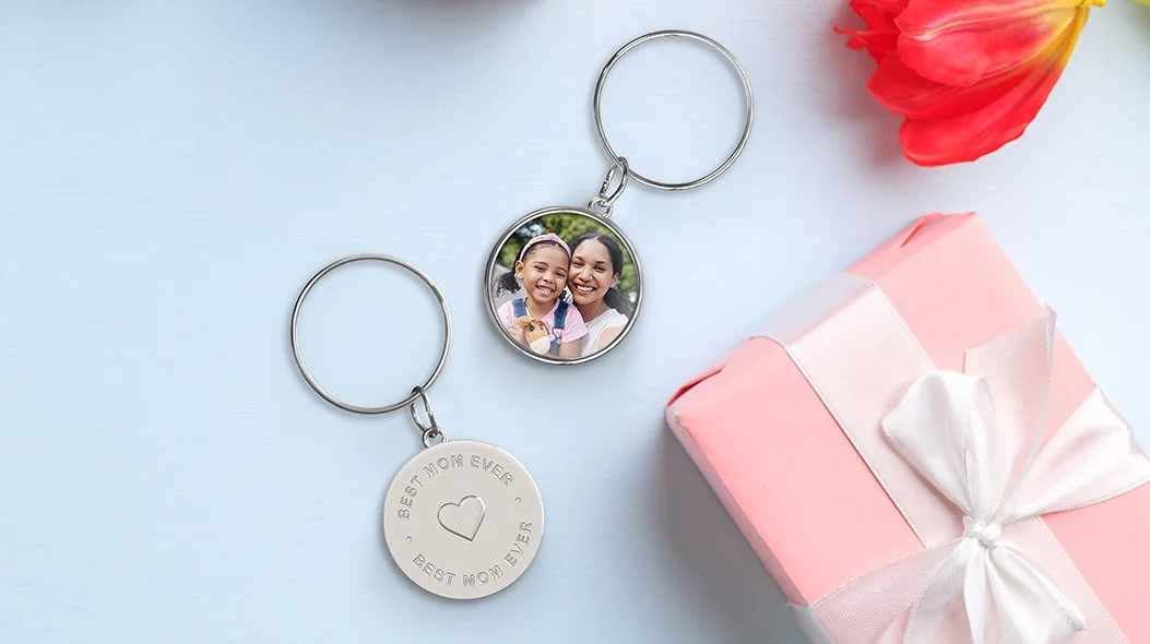 Custom Photo Keychain: Two circular unique keepsakes featuring a mother-daughter portrait and sentimental engraving.