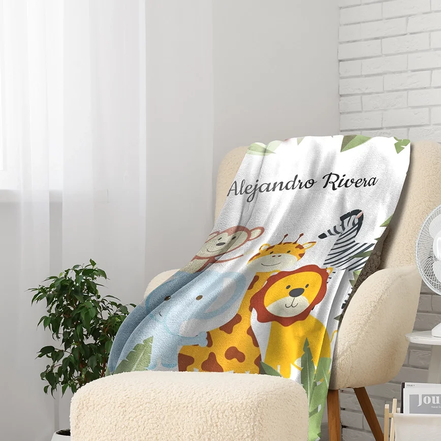 Custom photo blanket folded over a couch, a cozy personalized gift idea.
