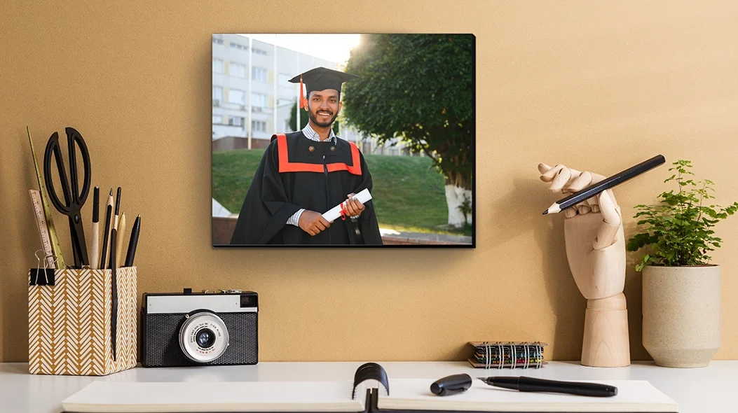 11x14 mounted wall art print featuring a graduation portrait in a home office setting.