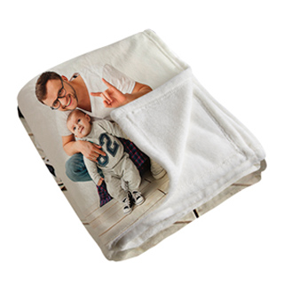 Fleece Blankets: A folded photo blanket showing a picture of a father and baby on the front and the soft fleece backing.