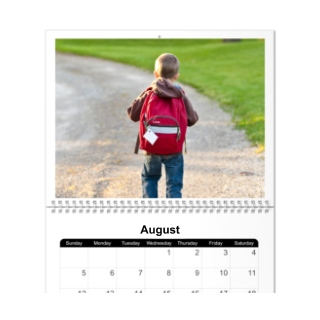 Custom wall calendar displaying a personal photo, helping students track their academic schedule.