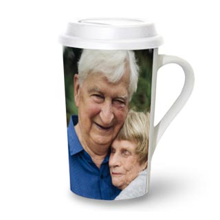 Premium Grande Mugs: A tall latte mug with a lid, personalized with a full wrap-around photo of an elderly couple.