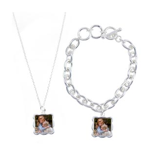 Necklace and Bracelet Set: A matching silver necklace and bracelet set, both with a square photo charm of two children.