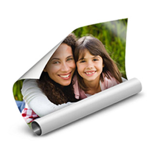 Posters: A partially rolled photo poster of a mother and daughter.