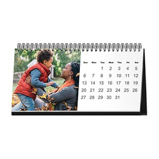 Desk Calendars: A personalized desktop calendar with an autumn photo of a mother and child.