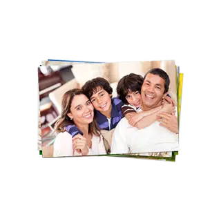 Prints: A stack of photo prints with the top photo showing a smiling family of four.