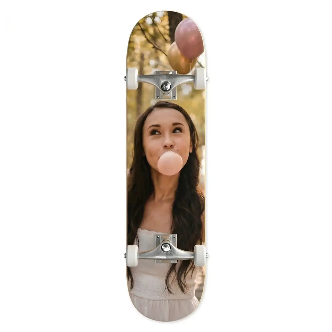 Unique personalized skateboard deck for a teen's birthday celebration.