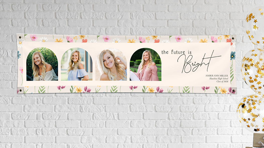 A Moment To Celebrate: A horizontal vinyl banner with a floral border and four photos of a graduate, featuring the text the future is Bright Amber Ann Miller Hawkins High School Class of 2026.
