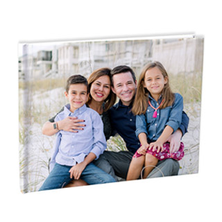 Photo Books: A square hardcover photo book with a full-bleed cover photo of a family at the beach.