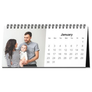 Desk Calendars: A personalized desktop calendar with a family photo on the left and the monthly date grid on the right.