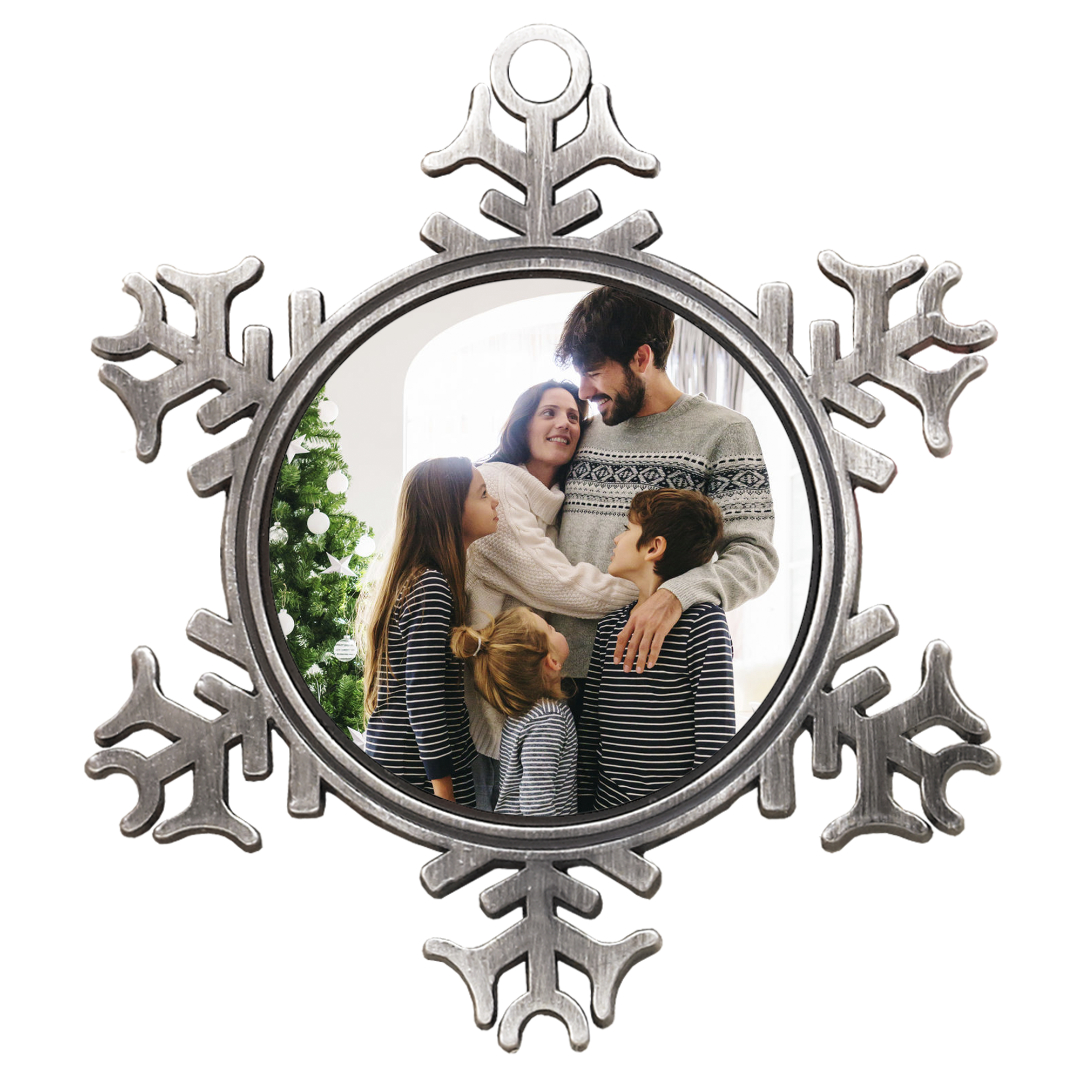 Metal Snowflake Ornament: A metal snowflake-shaped ornament with a circular photo of a family in the center.