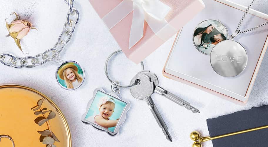 personalized jewelry: A collection of personalized photo jewelry including a charm bracelet, locket, and keychain.