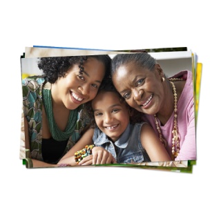 High-quality family photo prints stacked as cherished keepsakes