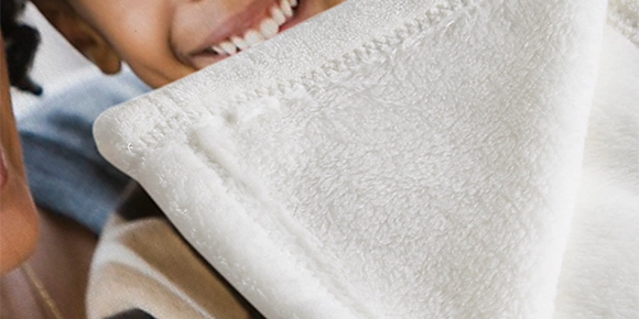 Plush fleece photo blanket with extra soft texture.