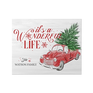 Personalized Canvas Wall Art: A customized wood pallet sign with a vintage holiday truck design and family name.