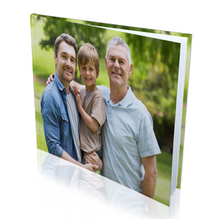 Photo Books: A hardcover photo book with a full photo of a grandfather, father, and son.
