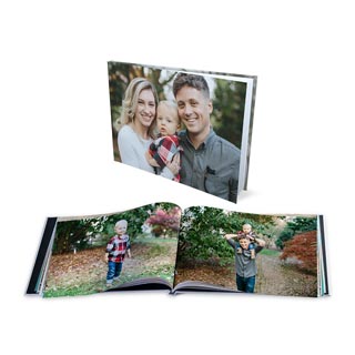 8x11 Hardcover Photo Books: A hardcover photo book with a family photo cover, shown closed and open to an inside spread.