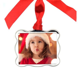 Metal Wave Ornament: A square metal ornament with wavy edges, featuring a photo of a child in a Santa hat.