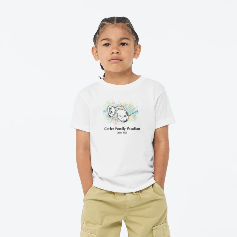 Youth Tee: A child wearing a white t-shirt with a personalized family vacation graphic of sunglasses.