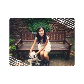 Magnets: A photo magnet of a girl sitting on a bench with her dog.
