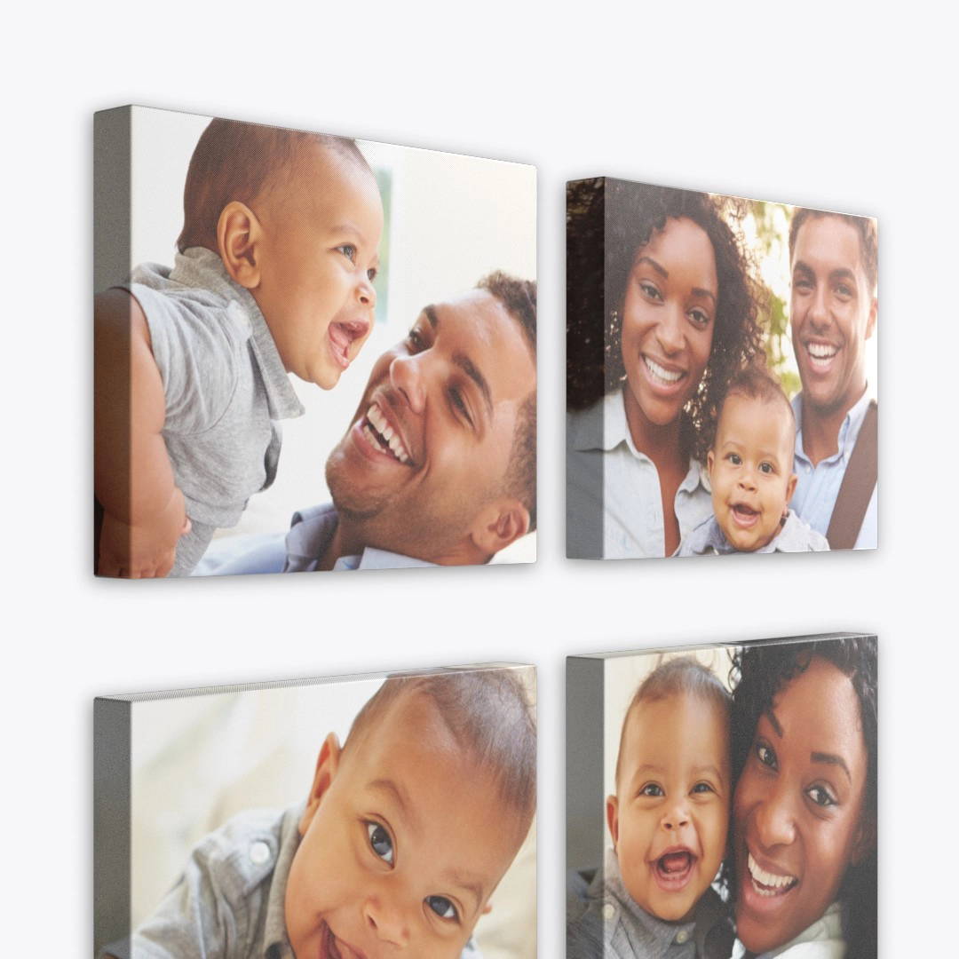 A cohesive wall grouping of four custom canvas prints featuring baby and family photography.