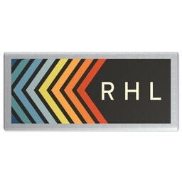 Power Banks: A personalized power bank with a retro chevron design and a three-letter monogram.