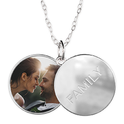 Sliding Locket Necklace Family: An open silver sliding locket with a photo of a couple on one side and the word Family on the other.