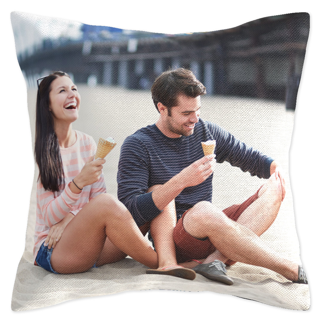 Custom photo pillow with personalized image, adding comfort to dorm decor.
