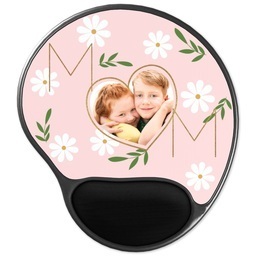 Mouse Pad With Wrist Rest: A pink mouse pad with a wrist rest, designed for a mom with a heart-shaped photo of her children.