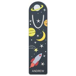 Bookmark: A personalized bookmark with a space theme, featuring a rocket ship, planets, and a custom name.